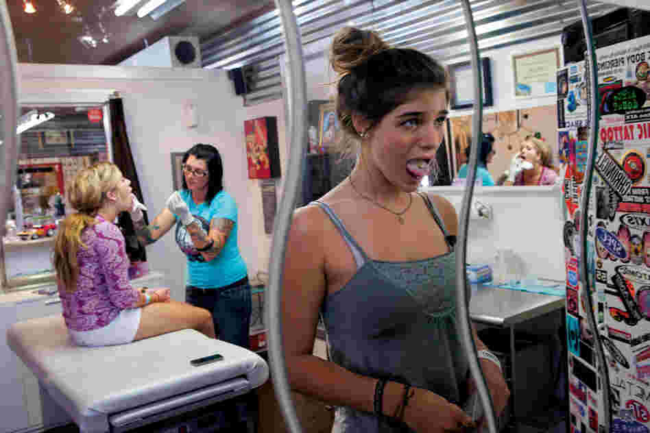 Taylor Dicristofalo (right) got her tongue pierced without her parents' permission while on an "adventure" with her best friend. Her father was thrilled when she removed the stud and the hole closed up.