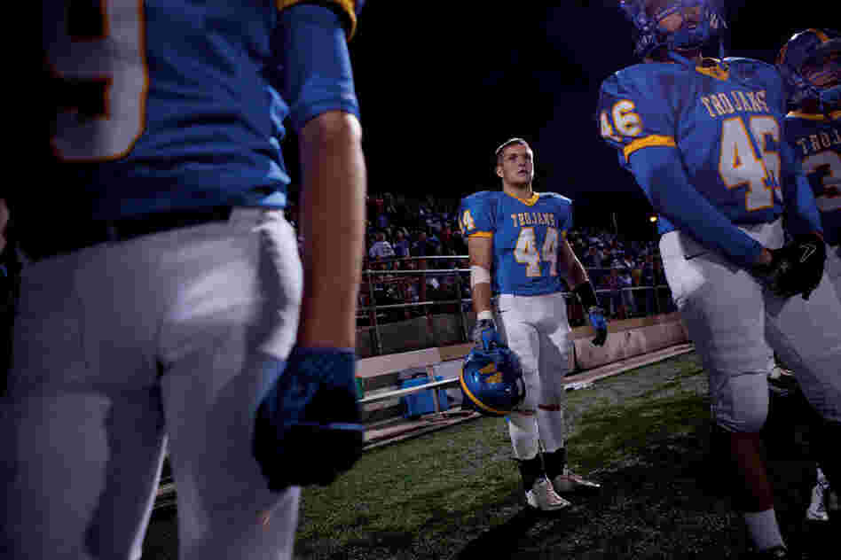 High school student Connor Sheehan (No. 44) decided to play in a football playoff game, despite having just completed rehab for a sprained ankle. His team won the game, but Sheehan re-injured himself. Research suggests that, compared with adults, teens value rewards more than consequences. 
