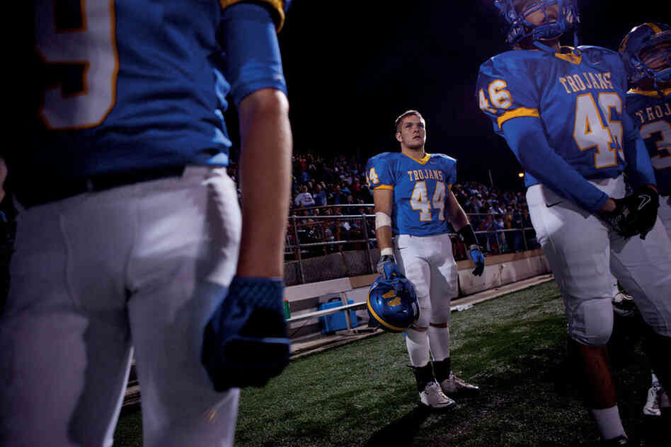 High school student Connor Sheehan (No. 44) decided to play in a football playoff game, despite having just completed rehab for a sprained ankle. His team won the game, but Sheehan re-injured himself. Research suggests that, compared with adults, teens value rewards more than consequences. 