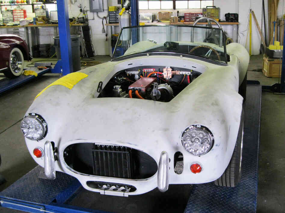 Jack Rickard and Brian Noto of EVTV are converting this replica 1966 AC Cobra to run entirely on batteries. The two host an online video series explaining how to convert a gas-guzzling road warrior into an all-electric vehicle. Jack Rickard and Brian Noto of EVTV are converting this replica 1966 AC Cobra to run entirely on batteries. The two host an online video series explaining how to convert a gas-guzzling road warrior into an all-electric vehicle.
