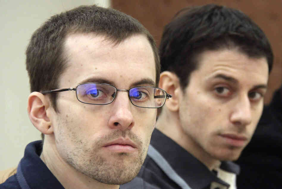 A photo released by Iran's state-run Press TV on Feb. 6, 2011, shows U.S. hikers Shane Bauer (left) and Josh Fattal at court in Tehran.