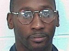 Death row inmate Troy Davis in an undated photo released by the Georgia Department of Corrections. Davis is scheduled to be executed today for the 1989 killing of Savannah police officer Mark MacPhail. Death row inmate Troy Davis in an undated photo released by the Georgia Department of Corrections. Davis is scheduled to be executed today for the 1989 killing of Savannah police officer Mark MacPhail.