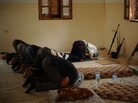 Libyan rebels pray before going out on patrol outside the port city of Misrata on April 30. Religion plays a major role in Libyan life, and Islamist groups want to be part of the new government. Libyan rebels pray before going out on patrol outside the port city of Misrata on April 30. Religion plays a major role in Libyan life, and Islamist groups want to be part of the new government.