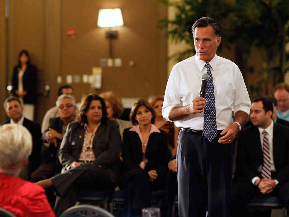 Republican presidential candidate Mitt Romney speaks during a town hall meeting in Miami on Wednesday. Republican presidential candidate Mitt Romney speaks during a town hall meeting in Miami on Wednesday.