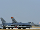 U.S. Air Force F-16 jet fighters sit on the tarmac at Aviano Air Base in Italy in March. The Air Force tested its jets on fuel made of 50 percent vegetable oil. U.S. Air Force F-16 jet fighters sit on the tarmac at Aviano Air Base in Italy in March. The Air Force tested its jets on fuel made of 50 percent vegetable oil.