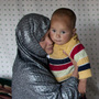 Sakina sits with her 18-month-old son, Shafiq, at a women's shelter in Bamiyan, in central Afghanistan, last October. Sakina spent seven months in prison for leaving a forced marriage. The Afghan government recently backed down from a plan to take control of women's shelters, and women's groups are hailing it as a victory. Sakina sits with her 18-month-old son, Shafiq, at a women's shelter in Bamiyan, in central Afghanistan, last October. Sakina spent seven months in prison for leaving a forced marriage. The Afghan government recently backed down from a plan to take control of women's shelters, and women's groups are hailing it as a victory.