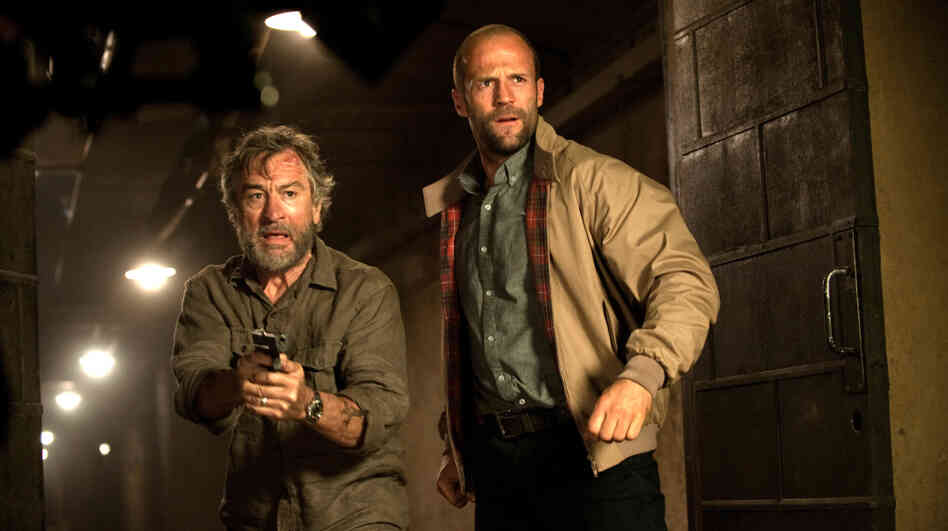 Misfire: Robert DeNiro (left) sleepwalks his way through Killer Elite, also starring Jason Statham.