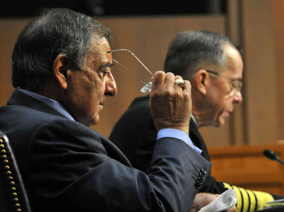 Chairman of the Joint Chiefs of Staff Adm. Mike Mullen (right) and Defense Secretary Leon Panetta testify before the Senate Armed Services Committee on Thursday. The Pentagon is tasked with cutting $450 billion from its budget in the next 10 years.