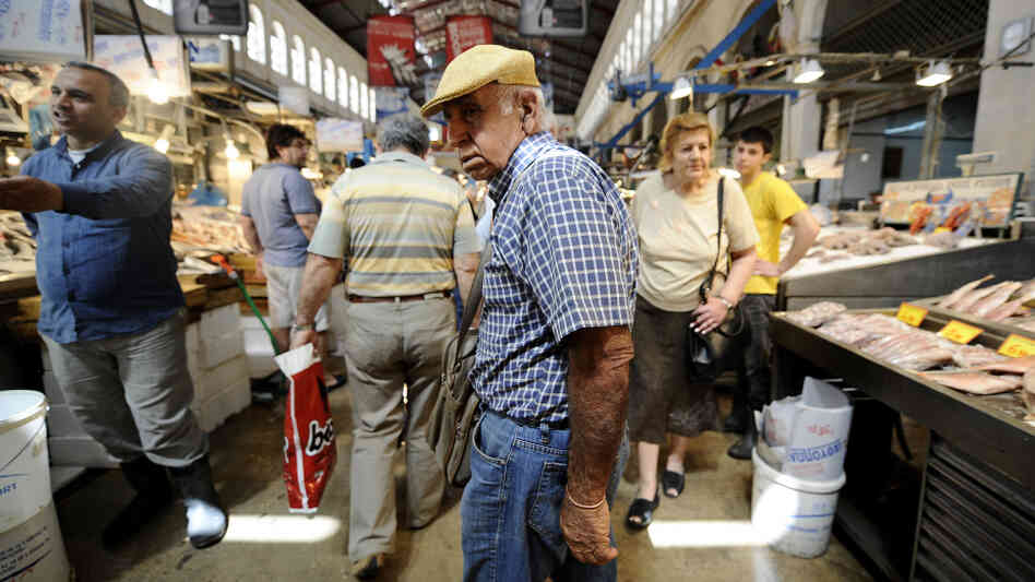 A pensioner shops in Athens' central market on May 12. The rapidly aging population in Europe will increasingly strain national budgets across the continent, where more retirees will be depending on fewer workers. A pensioner shops in Athens' central market on May 12. The rapidly aging population in Europe will increasingly strain national budgets across the continent, where more retirees will be depending on fewer workers.