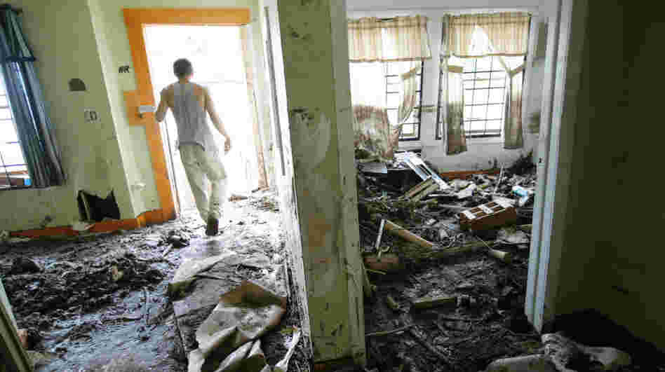 Justin Mudge walks through the muddy interior of his great uncle's gun shop, destroyed by flooding caused by Irene on Sept. 1 in Prattsville, N.Y. FEMA will run out of money to help disaster victims by early next week unless Congress acts. Justin Mudge walks through the muddy interior of his great uncle's gun shop, destroyed by flooding caused by Irene on Sept. 1 in Prattsville, N.Y. FEMA will run out of money to help disaster victims by early next week unless Congress acts.
