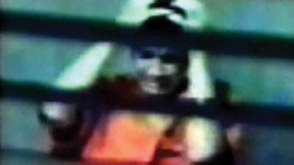 This photo, taken from a 2003 U.S. Department of Defense surveillance video, was released by Omar Khadr's lawyers. Khadr (pictured) is in an interrogation room at the Guantanamo Bay detention facility. This photo, taken from a 2003 U.S. Department of Defense surveillance video, was released by Omar Khadr's lawyers. Khadr (pictured) is in an interrogation room at the Guantanamo Bay detention facility.