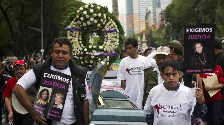 Mexican journalists march in a protest against violence directed against the media on Sept. 11, in Mexico City. Drug cartels, which have been responsible for many of the deaths, are now intimidating social media sites. Mexican journalists march in a protest against violence directed against the media on Sept. 11, in Mexico City. Drug cartels, which have been responsible for many of the deaths, are now intimidating social media sites.