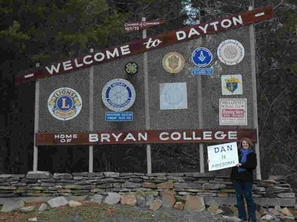 Proverbs 31:23 says that a virtuous woman's husband is "respected at the city  gate," so Evans made a poster that said "Dan is Awesome" and stood in front of  the "Welcome to Dayton" sign for 30 minutes one  afternoon.