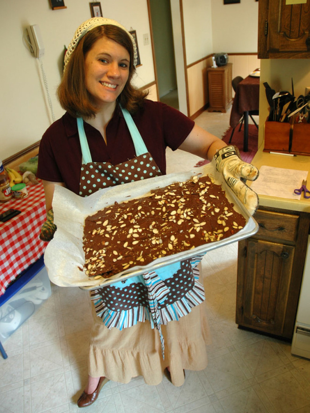 In deference to Titus 2:3-5 and 1 Timothy 5:14, Rachel Held Evans tried to stay "busy in  the home," honing her cooking, cleaning and hospitality skills. She is seen here with homemade matzah toffee for Passover.