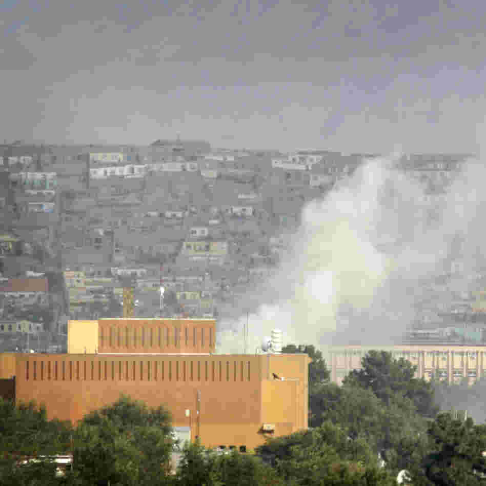 Dust rises after firing by Taliban militants in Kabul, Afghanistan, after Taliban insurgents fired rocket-propelled grenades and assault rifles at the U.S. Embassy earlier this month.