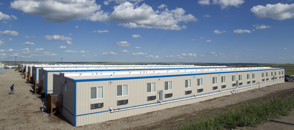 The North Dakota oil boom has produced a housing shortage — and workers are living in company-owned "man camps" like this one outside the town of Williston.