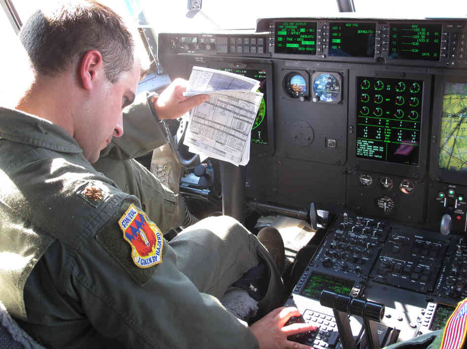 Air Force Maj. Josh Frey pilots a plane running on jet biofuel. Frey says his C-130 flies the same on 50 percent biofuel as it does on petroleum. Air Force Maj. Josh Frey pilots a plane running on jet biofuel. Frey says his C-130 flies the same on 50 percent biofuel as it does on petroleum.