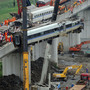 Workers clear the wreckage of a July 23 high-speed-train collision in Wenzhou in eastern China's Zhejiang province. The crash killed 40 people and raised questions about the safety of the country's high-speed-rail network, which the Chinese government has held up as an example of its technological prowess and with which it had hoped to attract overseas buyers.