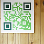 Manuel Martinez, the manager of a popular salad restaurant in Washington, D.C., called Sweetgreen, assists a customer. Martinez says customers use the QR code on the wall to learn about promotions and to get discounts. Manuel Martinez, the manager of a popular salad restaurant in Washington, D.C., called Sweetgreen, assists a customer. Martinez says customers use the QR code on the wall to learn about promotions and to get discounts.