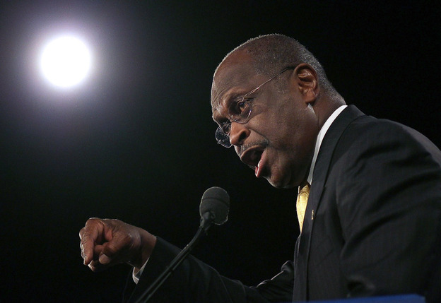 Republican presidential candidate Herman Cain speaks in Orlando, Fla., on Saturday. He won a GOP straw poll there with 37 percent of the vote.