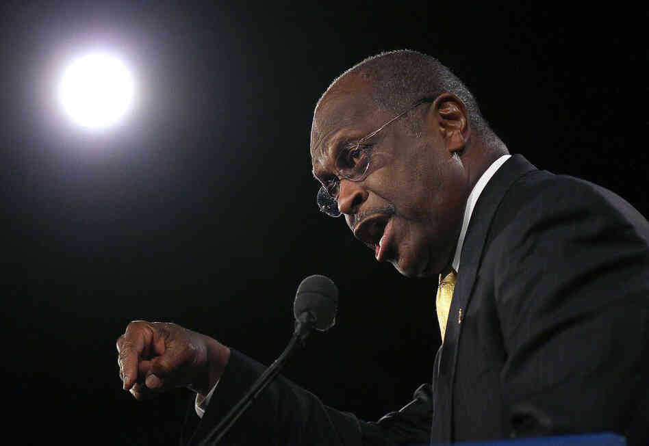 Republican presidential candidate Herman Cain speaks in Orlando, Fla., on Saturday. He won a GOP straw poll there with 37 percent of the vote.