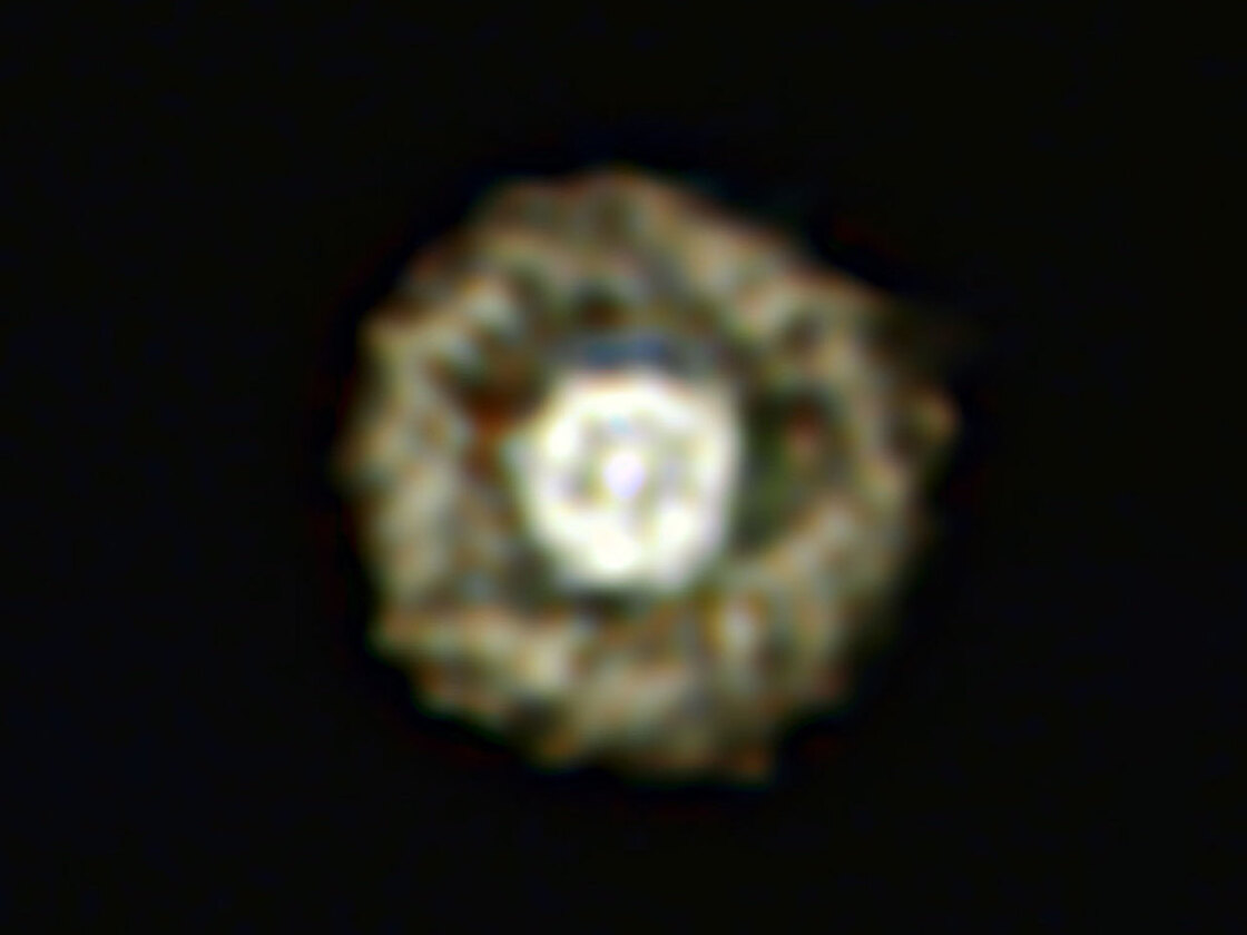 This picture of the nebula around a rare yellow hypergiant star called  IRAS 17163-3907 is the best ever taken of a star in this class and shows  for the first time a huge dusty double shell surrounding the central  hypergiant. The star and its shells resemble an egg white around a yolky  center, leading astronomers to nickname the object the Fried Egg  Nebula.