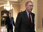 Senate Republican leader Mitch McConnell of Kentucky walks to the floor as the Senate prepares to vote on a short-term funding measure . Senate Republican leader Mitch McConnell of Kentucky walks to the floor as the Senate prepares to vote on a short-term funding measure .