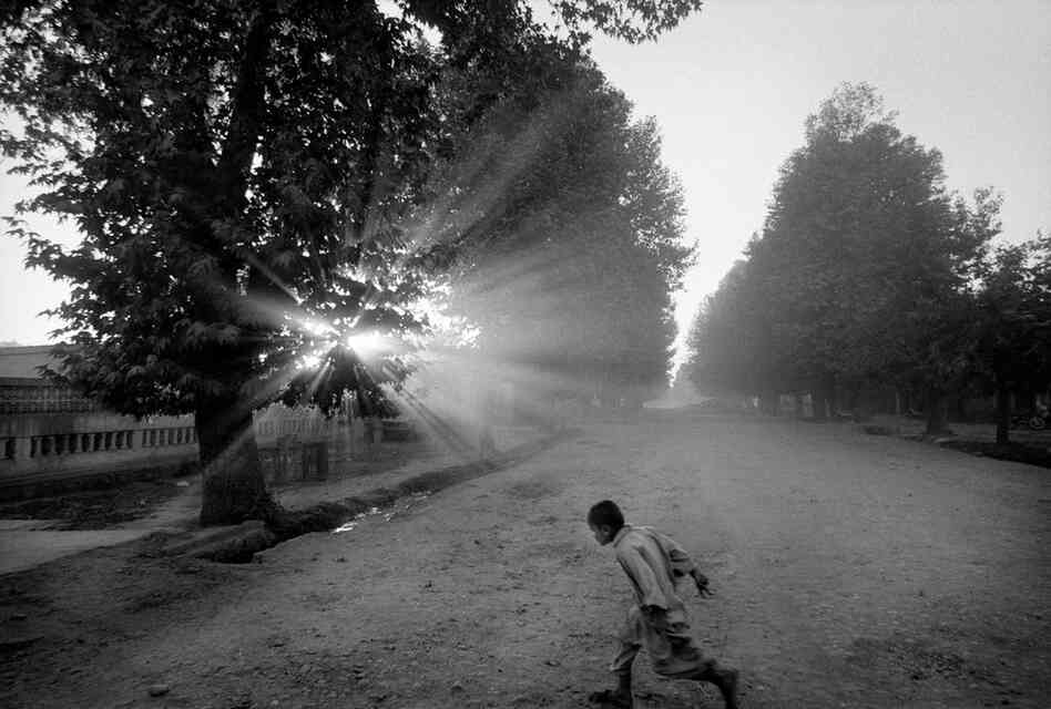 Returning home before night falls, Takhar Province, 2004