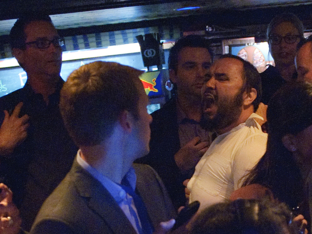 The man who interrupted President Obama during a fundraiser Monday in Los Angeles is removed from the audience.