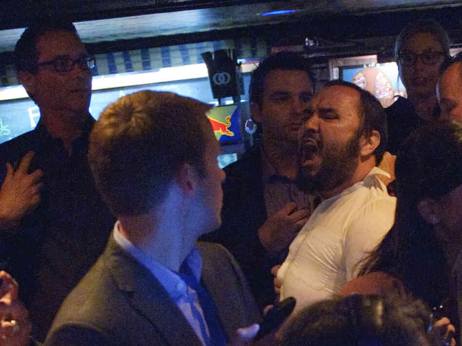 The man who interrupted President Obama during a fundraiser Monday in Los Angeles is removed from the audience.