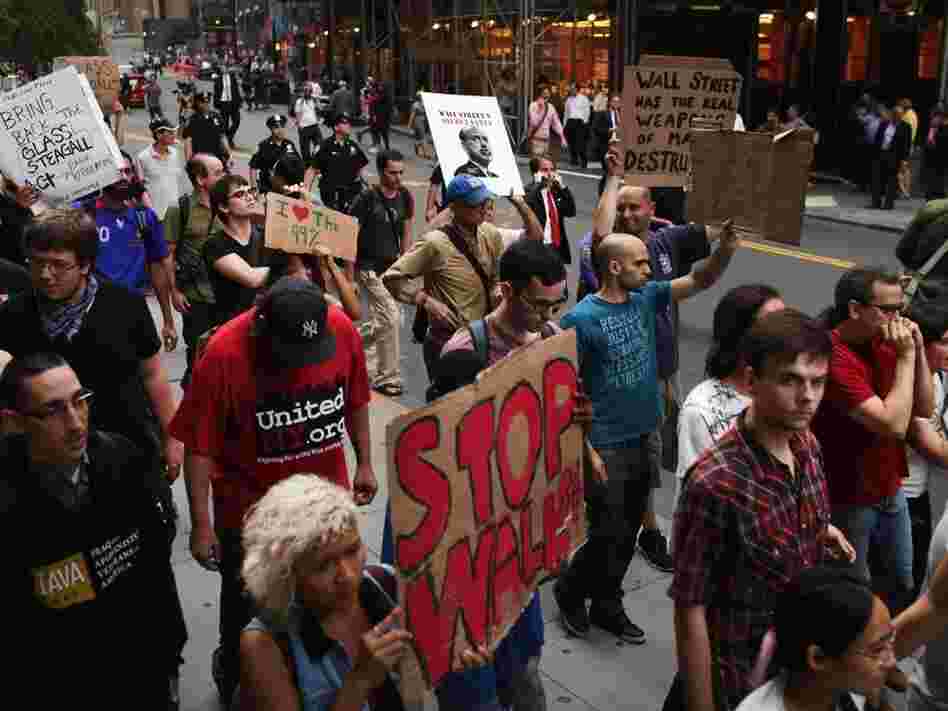 Demonstrators opposed to corporate profits on Wall Street march in the Financial District on September 26, 2011 New York City.