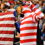 Fans of the Tampa Bay Rays celebrate during the singing of "God Bless America" during the game against the Boston Red Sox at Tropicana Field on Sept. 11 in St. Petersburg, Fla.