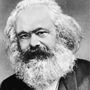 In the Communist Manifesto, Karl Marx (above) and Friedrich Engels used the German word Klassenkampfen, which translates as "class struggles." Their critics rendered it as "class warfare." In the Communist Manifesto, Karl Marx (above) and Friedrich Engels used the German word Klassenkampfen, which translates as "class struggles." Their critics rendered it as "class warfare."