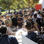At the bake sale on Tuesday. Protesters to the right. Young Republicans and their supporters to the left.