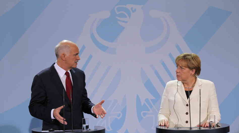 German Chancellor Angela Merkel and Greek Prime Minister George Papandreou speak during talks Tuesday in Berlin. Germany's lower house of parliament voted 523-85 to bolster the European bailout fund, which is designed to help Greece and other troubled countries. German Chancellor Angela Merkel and Greek Prime Minister George Papandreou speak during talks Tuesday in Berlin. Germany's lower house of parliament voted 523-85 to bolster the European bailout fund, which is designed to help Greece and other troubled countries.