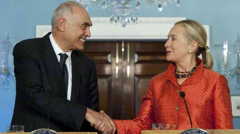 U.S. Secretary of State Hillary Clinton shakes hands with Egypt's Foreign Minister Mohammed Kamel Amr during a joint press conference in Washington on Wednesday. Amr sought to assure the U.S. that Egypt is moving toward democracy. U.S. Secretary of State Hillary Clinton shakes hands with Egypt's Foreign Minister Mohammed Kamel Amr during a joint press conference in Washington on Wednesday. Amr sought to assure the U.S. that Egypt is moving toward democracy.