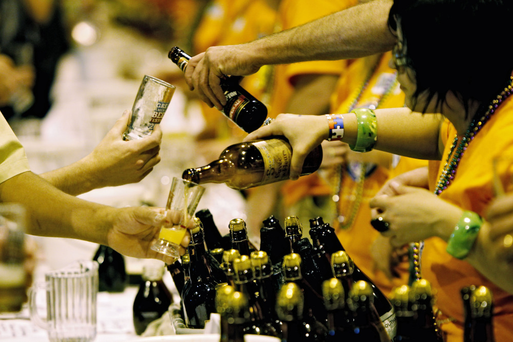 Vendors pour beer at the 2010 Great American Beer Festival in Denver. More than 400 breweries are expected to attend this year's festival, which sold out its 40,000 tickets in just a few days.