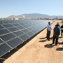 Officials from Arizona-based First Solar and a New Mexico power company gather after the dedication of a new solar array in Albuquerque in April. Officials from Arizona-based First Solar and a New Mexico power company gather after the dedication of a new solar array in Albuquerque in April.