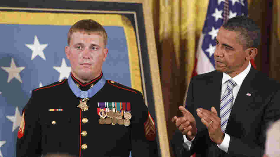 President Barack Obama applauds former Marine Cpl. Dakota Meyer, 23, on Thursday, Sept. 15, 2011, after awarding him the Medal of Honor at the White House.