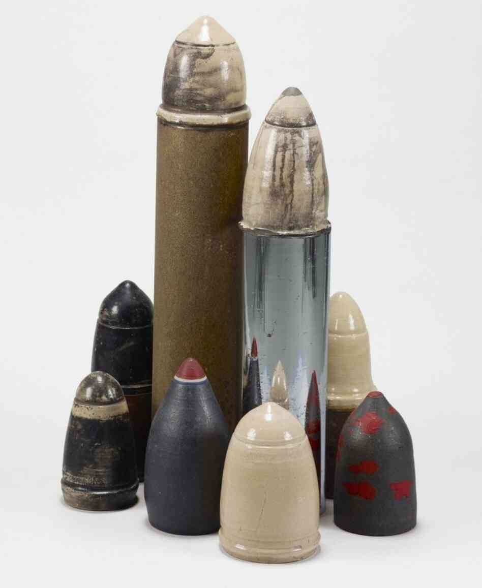 Artist Dale Davis created Viet Nam Game in 1969 in response to the draft imposed by the Vietnam War. Standing 4 feet high, the structure is meant to resemble bombs. Artist Dale Davis created Viet Nam Game in 1969 in response to the draft imposed by the Vietnam War. Standing 4 feet high, the structure is meant to resemble bombs.
