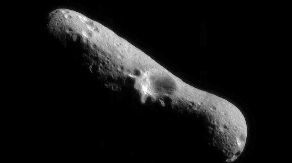 This picture of the Eros asteroid is the first of an asteroid taken from an orbiting spacecraft. The crater at the center is about 4 miles across. This picture of the Eros asteroid is the first of an asteroid taken from an orbiting spacecraft. The crater at the center is about 4 miles across.