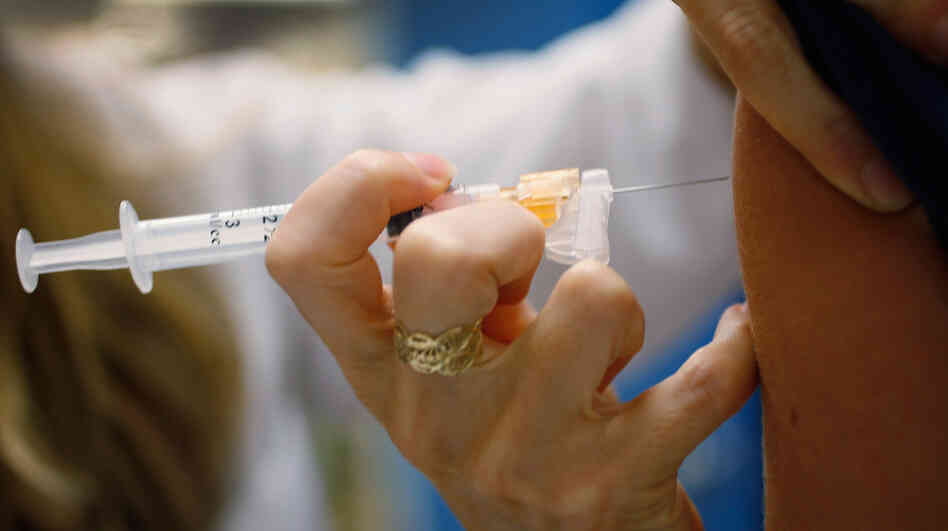 University of Miami pediatrician Judith L. Schaechter gives an HPV vaccination to a 13-year-old girl last week in Miami.