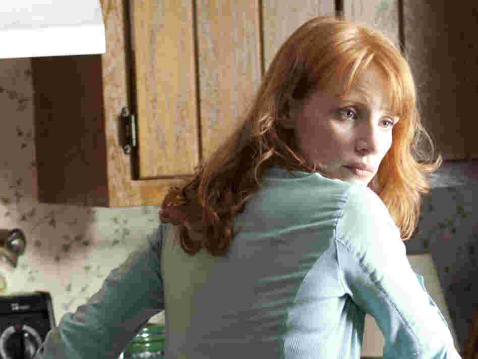 Jessica Chastain plays the protagonist's increasingly frustrated wife, who can't see — and can't comprehend — the visions that terrify her husband.