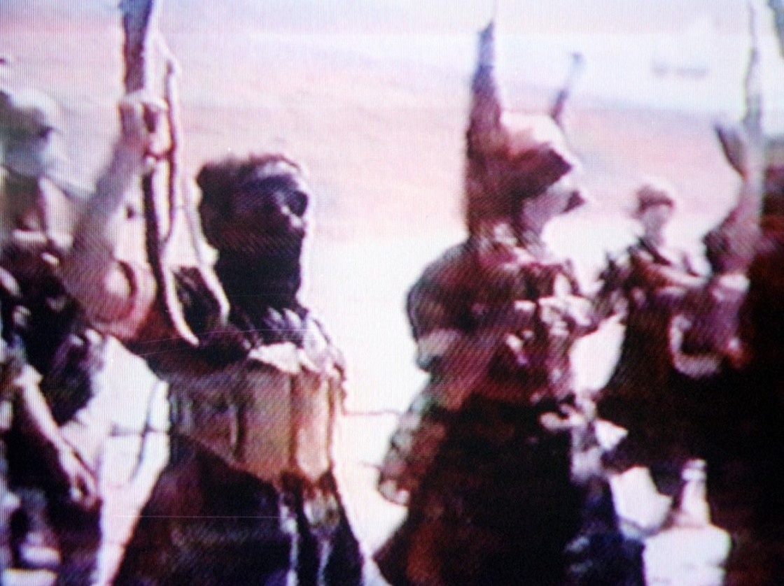 June 2001: al-Qaida members training in Afghanistan (frame grab from an al-Qaida video).