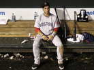 The agony: Boston Red Sox third baseman Mike Aviles sits in the dugout after his team's 4-3 loss to the Baltimore Orioles Wednesday (Sept. 28, 2011).