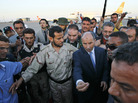 Abdel Hakim Belhaj (center left), a prominent militia commander, walks with Transitional National Council Chairman Mustafa Abdel Jalil in Tripoli on Sept. 10. The battle to oust Moammar Gadhafi produced a number of leaders who will have to work together to form a new government. Abdel Hakim Belhaj (center left), a prominent militia commander, walks with Transitional National Council Chairman Mustafa Abdel Jalil in Tripoli on Sept. 10. The battle to oust Moammar Gadhafi produced a number of leaders who will have to work together to form a new government.