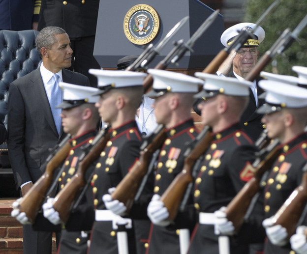 President Obama at the retirement ceremony for Joint Chiefs Chairman Adm. Mike Mullen (r) Sept. 30, 2011.