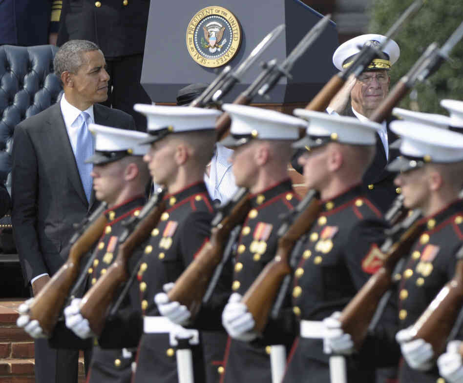 President Obama at the retirement ceremony for Joint Chiefs Chairman Adm. Mike Mullen (r) Sept. 30, 2011.