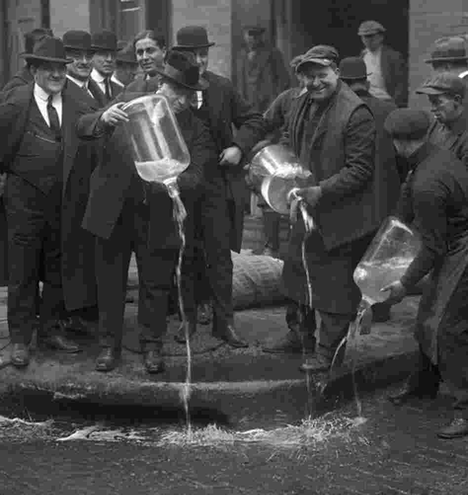 Agents pour out alcohol into the gutter during a raid. Ken Burns' Prohibition airs beginning Sunday night on PBS. Agents pour out alcohol into the gutter during a raid. Ken Burns' Prohibition airs beginning Sunday night on PBS.