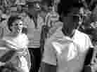 Elizabeth Eckford (right) attempts to enter Little Rock High School on Sept. 4, 1957, while Hazel Bryan (left) and other segregationists protest. The book Elizabeth and Hazel chronicles not just that event but the months and years that came after in the two women's lives.